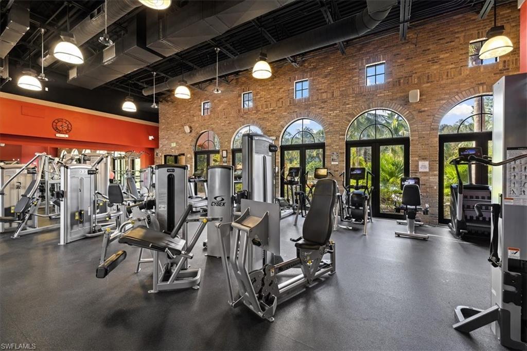 8985 Cambria Circle, Unit 211 Naples, FL 34113 - Photo 29 of 41 a view of a room with gym equipment