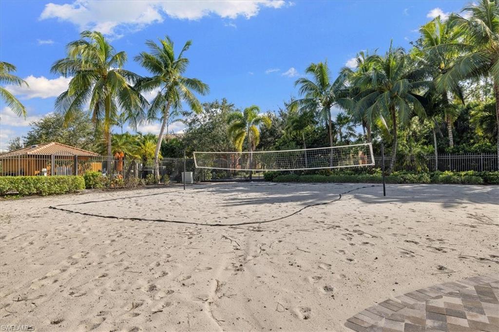 8985 Cambria Circle, Unit 211 Naples, FL 34113 - Photo 33 of 41 a backyard of a house with lots of green space