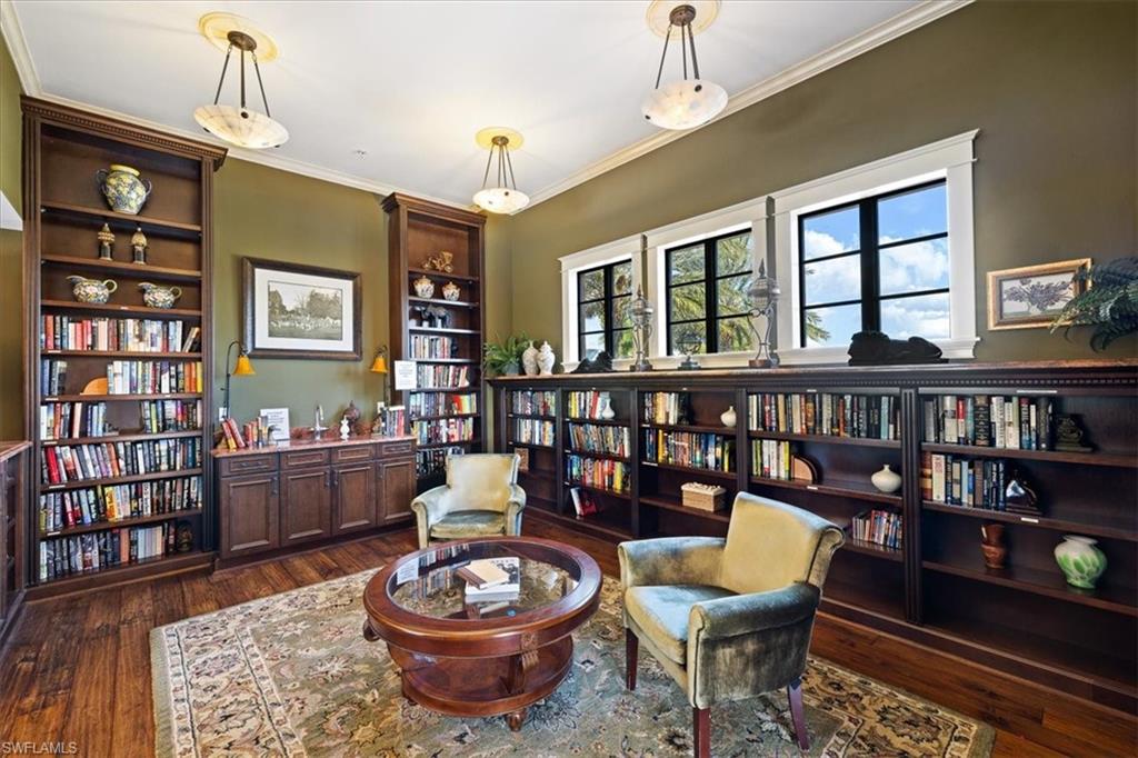 8985 Cambria Circle, Unit 211 Naples, FL 34113 - Photo 35 of 41 a living room with furniture and a window