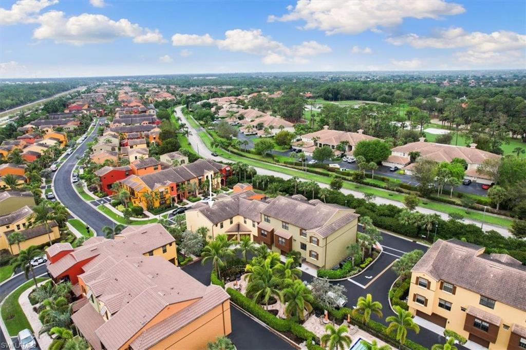 8985 Cambria Circle, Unit 211 Naples, FL 34113 - Photo 41 of 41 an aerial view of residential houses with outdoor space and street view