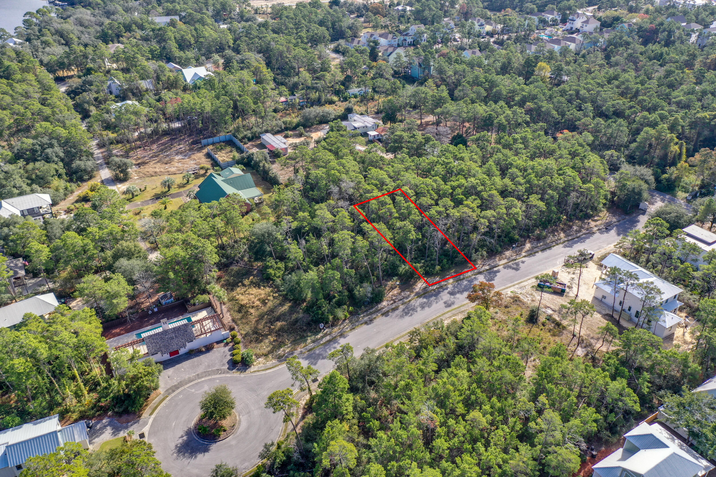Lot 5 Pine Cone Trail Inlet Beach Inlet Beach, FL 32461 - Photo 1 of 8 an aerial view of residential house with outdoor space and trees all around