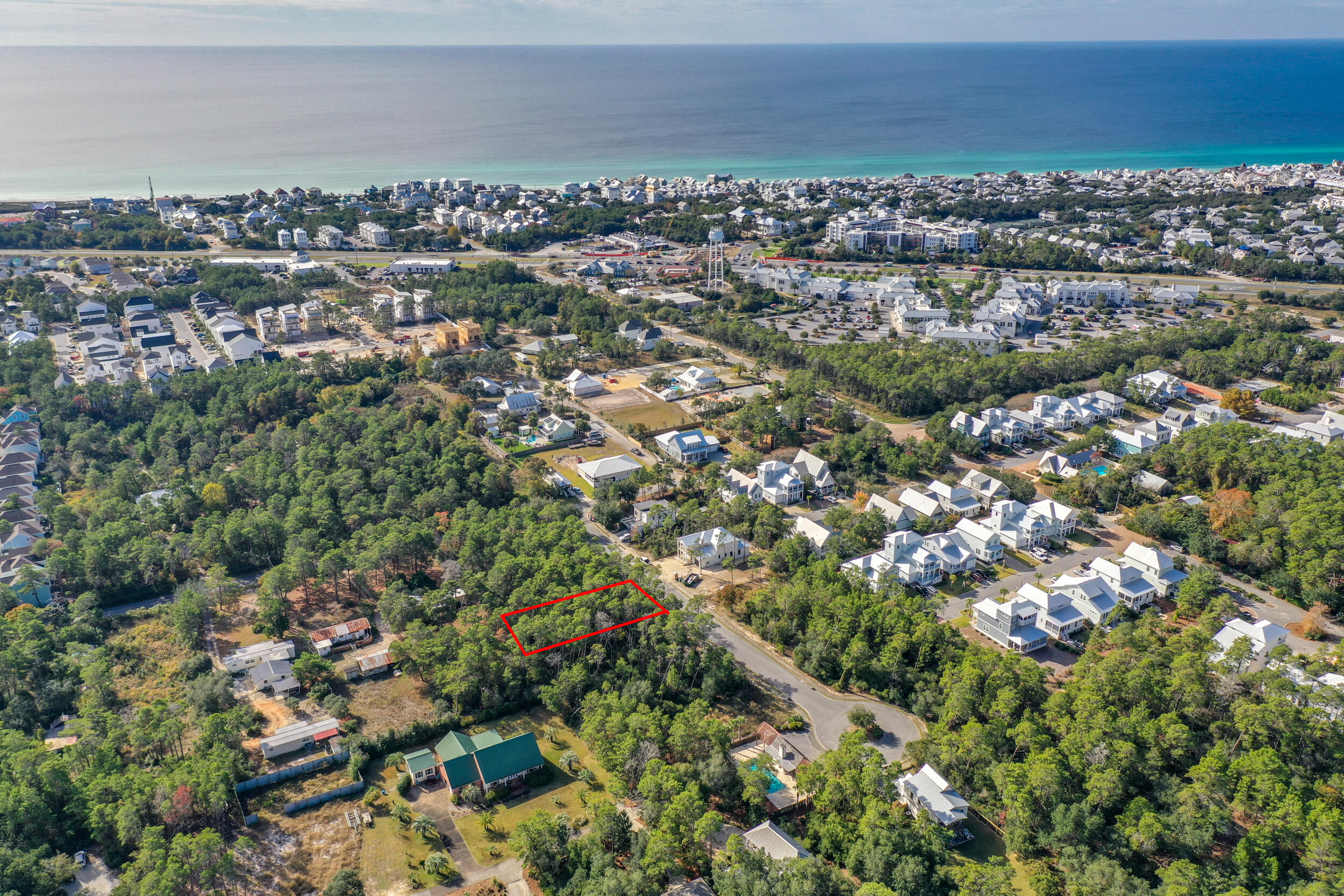 Lot 5 Pine Cone Trail Inlet Beach Inlet Beach, FL 32461 - Photo 3 of 8 an aerial view of a city with lots of residential buildings