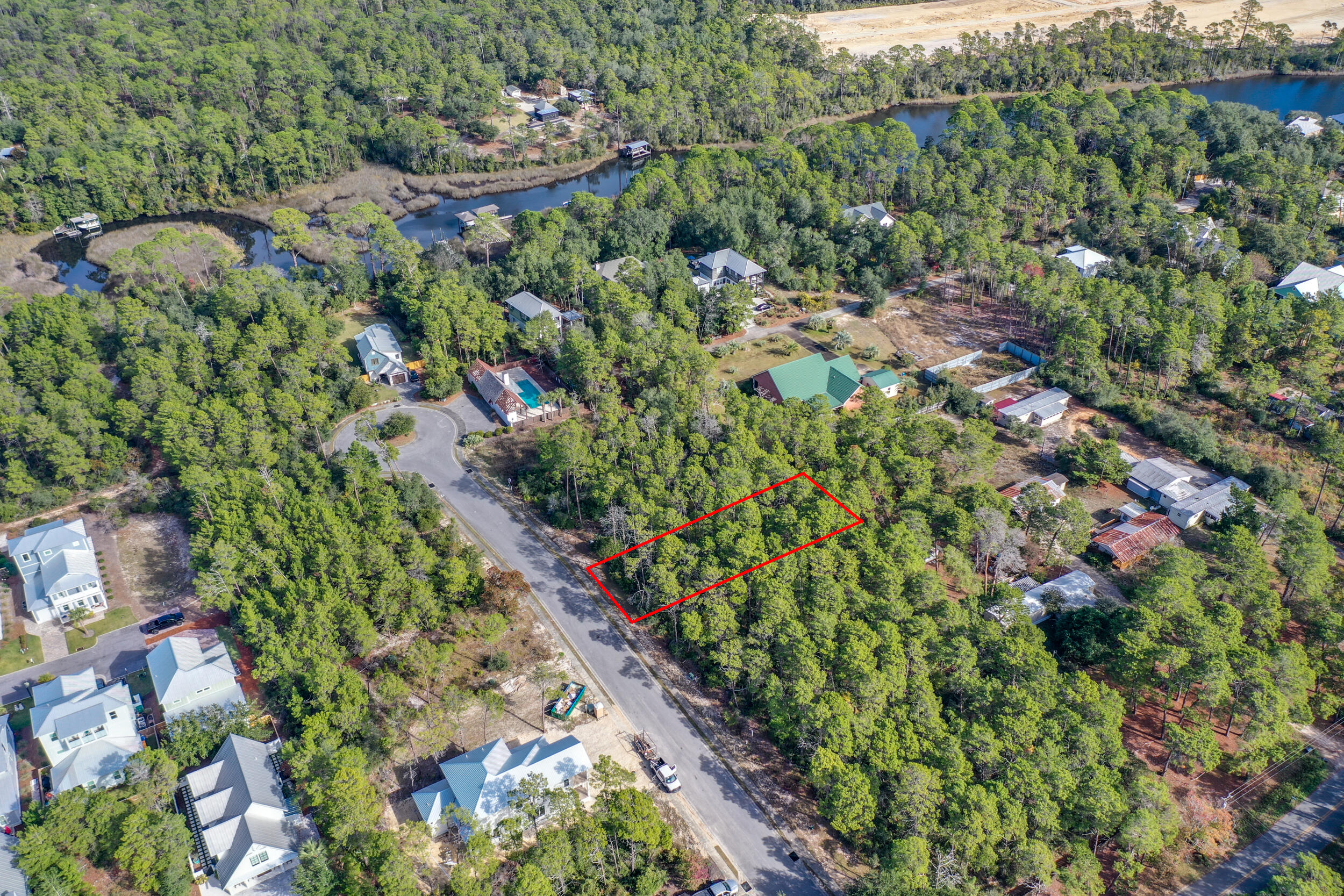 Lot 5 Pine Cone Trail Inlet Beach Inlet Beach, FL 32461 - Photo 5 of 8 a view of a garden with a tree