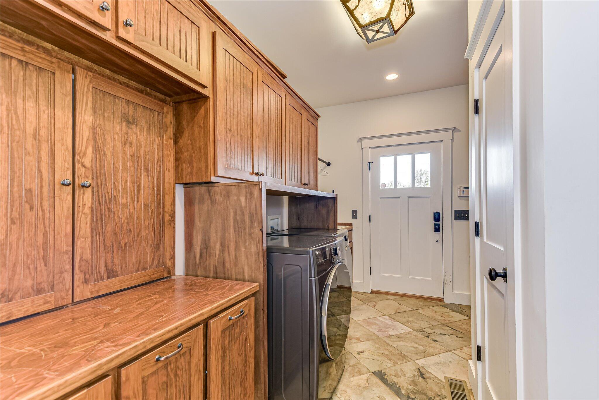 1063 Colbert Bridge Road Aiken, SC 29803 - Photo 23 of 68 a kitchen with stainless steel appliances granite countertop a refrigerator and a stove top oven