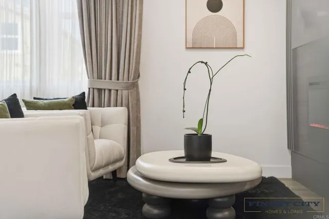 a view of walk in closet with clothes