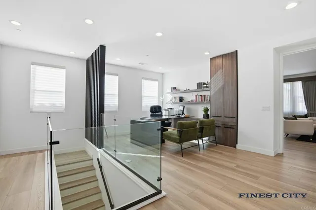 a view of a patio with a dining table and chairs