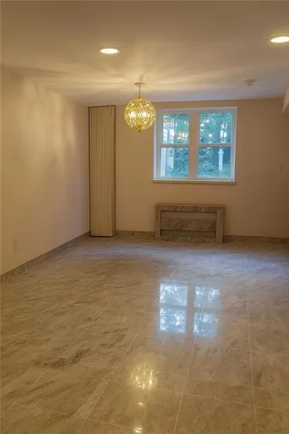 a bathroom with a shower and a sink