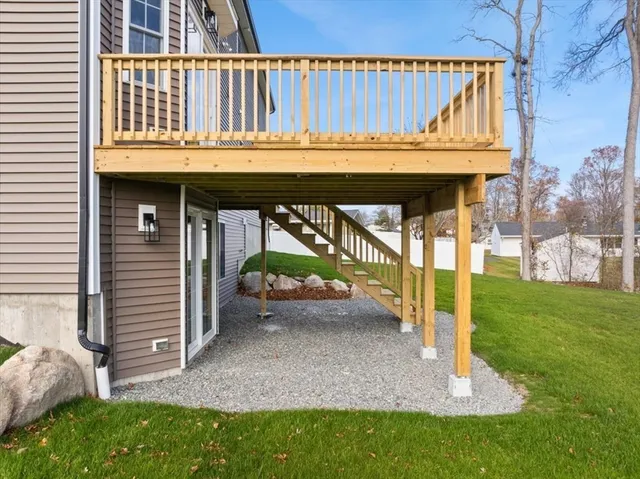 a view of a deck with a backyard