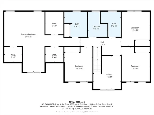 a picture of a bathroom with a white wall