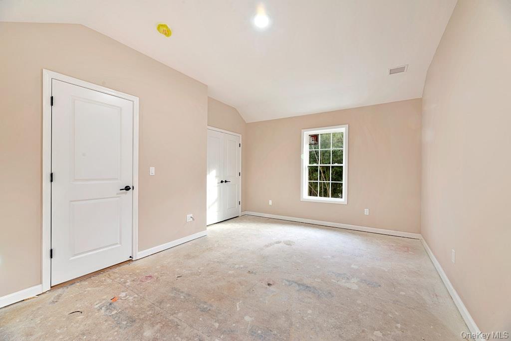 514 Neighborhood Road Shirley, NY 11967 - Photo 11 of 20 an empty room with windows