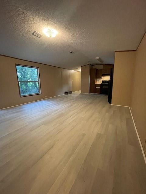 3125 Bois D Arc Road Combine, TX 75159 - Photo 7 of 15 Living and Dining Area overlooking kitchen with light hardwood / wood-style floors