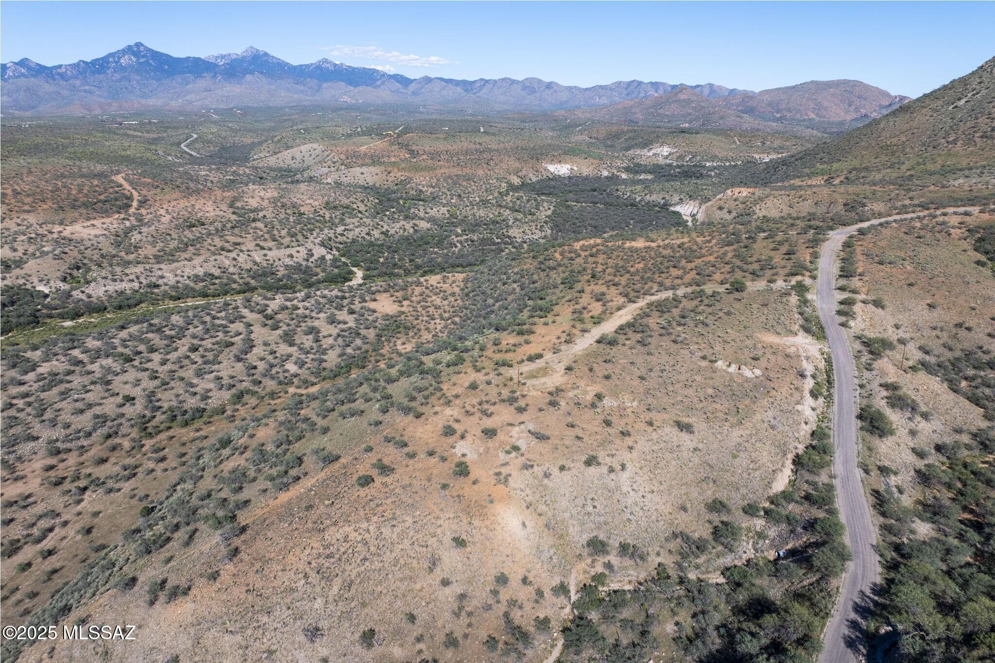 1869 Higuera Court, Unit 51 Rio Rico, AZ 85648 - Photo 1 of 6 a view of an outdoor space with mountain view