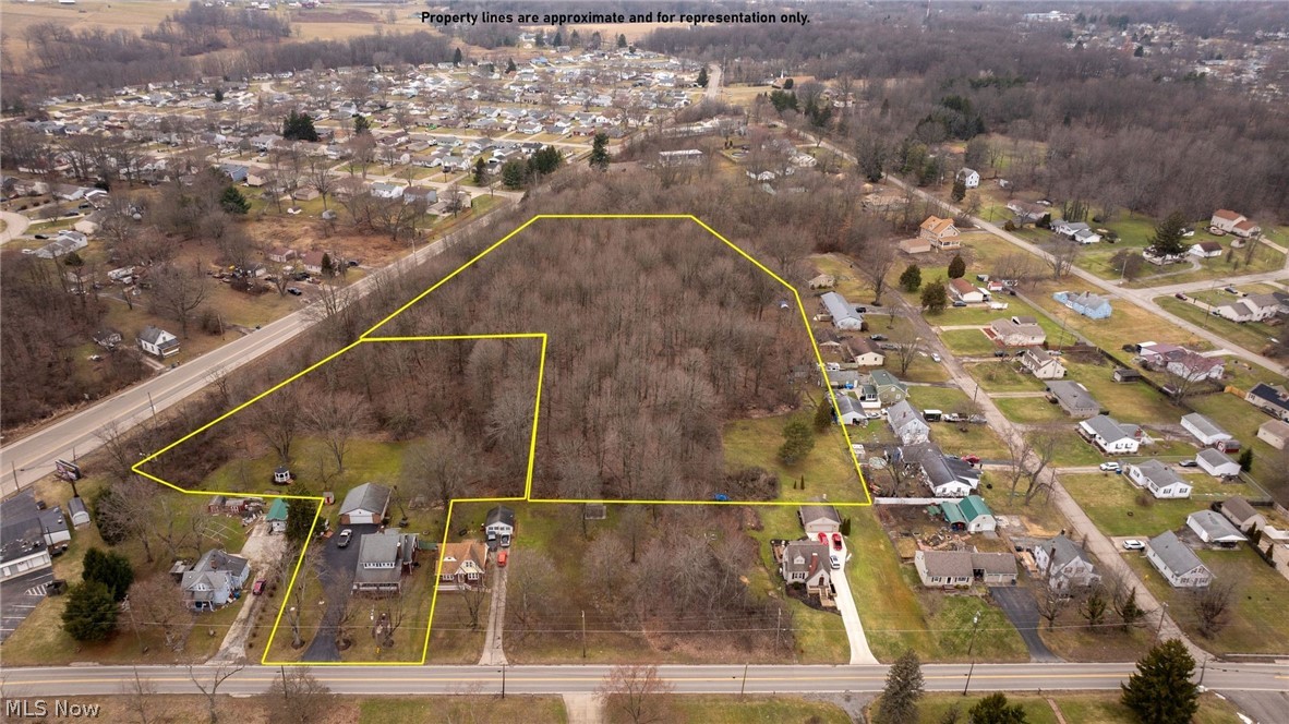 0 Salt Springs Road McDonald, OH 44437 - Photo 7 of 13 Aerial perspective of suburban area featuring property boundaries highlighted