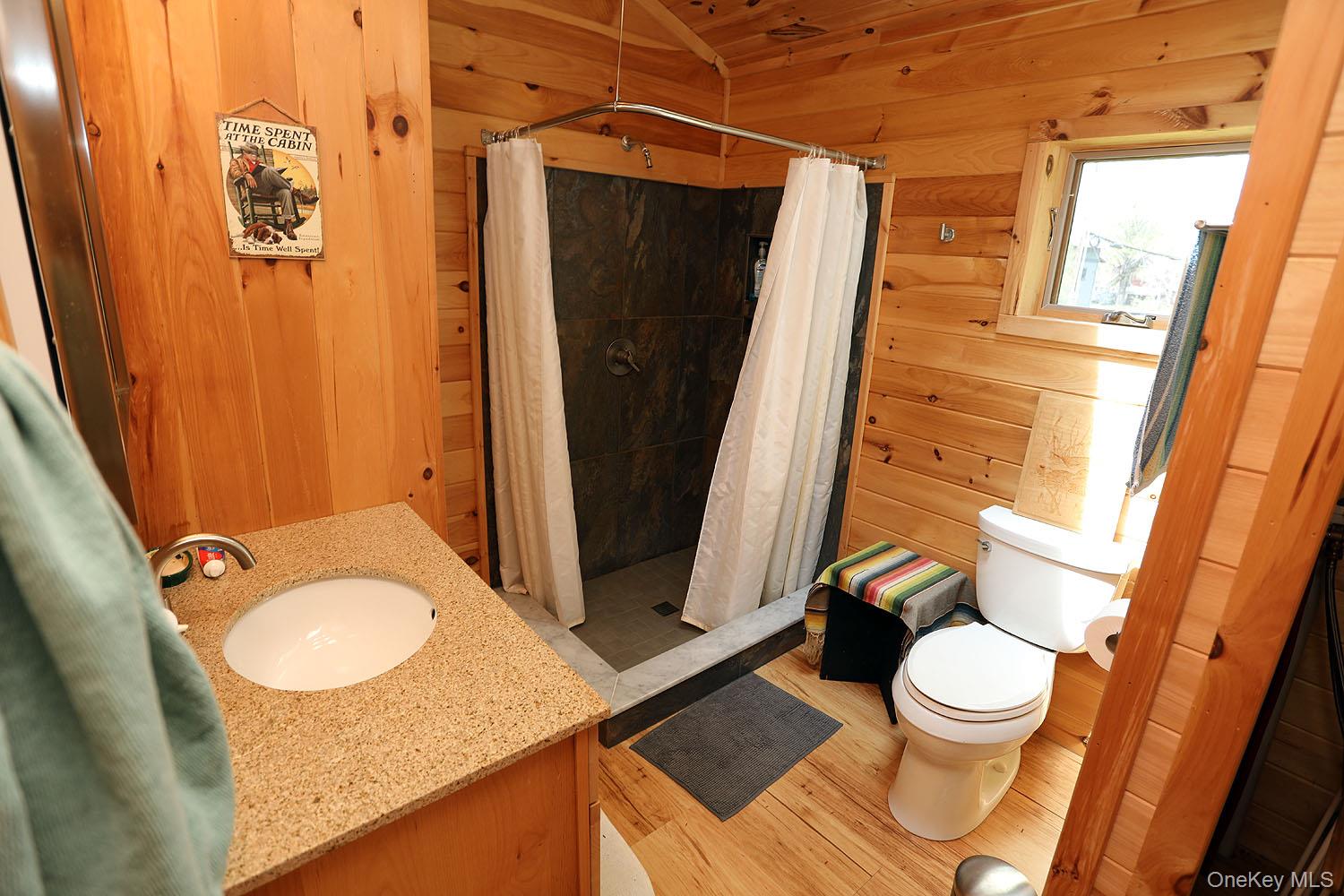 5120 Peas Eddy Road Hancock, NY 13783 - Photo 24 of 37 a bathroom with a sink toilet and shower