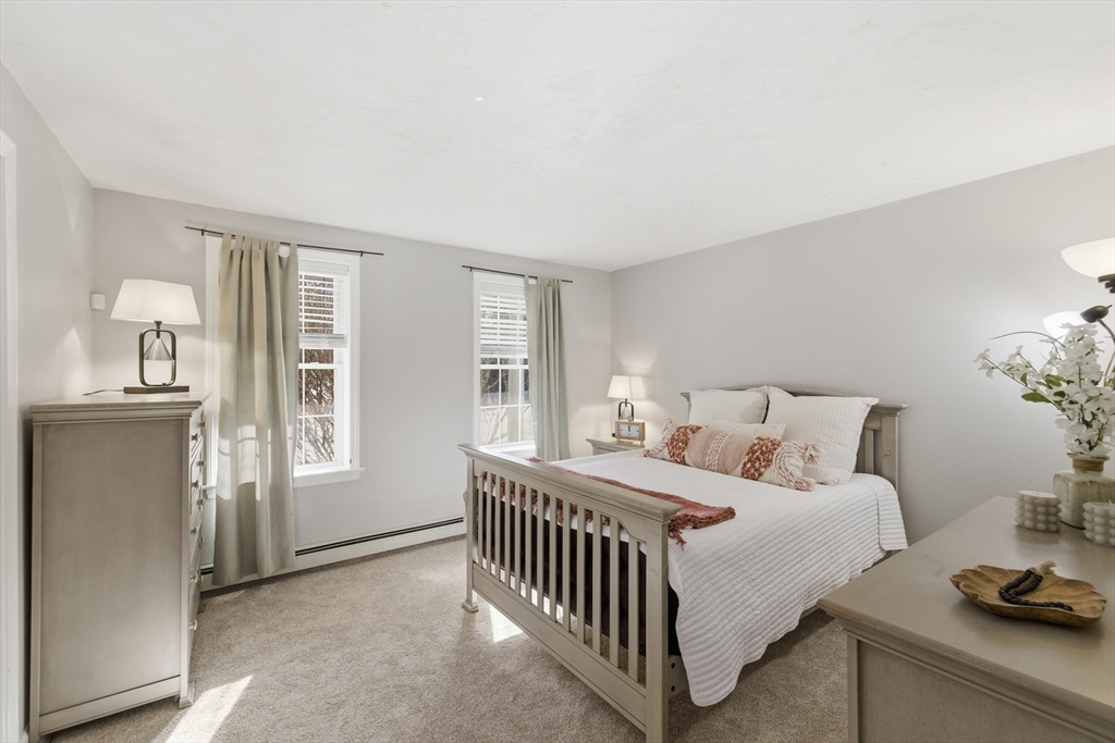 318 Old Mill Road Barnstable, MA 02648 - Photo 14 of 36 a bedroom with a bed and a window