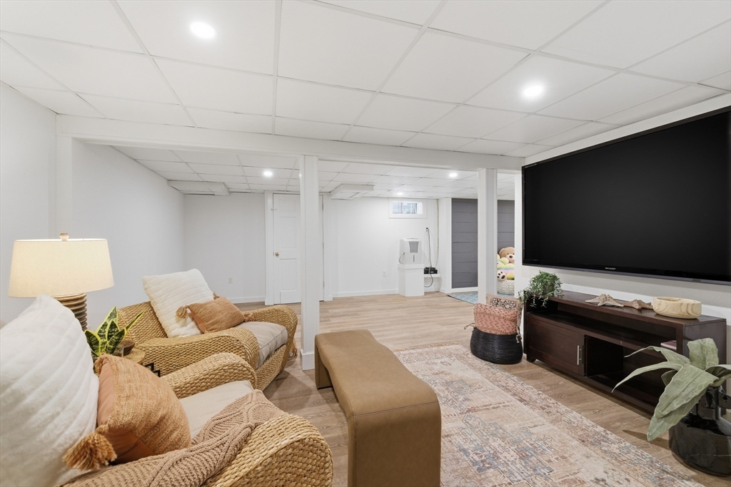 318 Old Mill Road Barnstable, MA 02648 - Photo 17 of 36 a living room with furniture and a flat screen tv