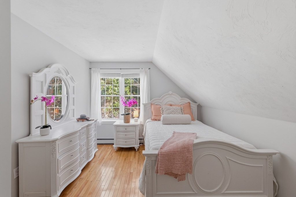 318 Old Mill Road Barnstable, MA 02648 - Photo 25 of 36 a bedroom with furniture and a large window