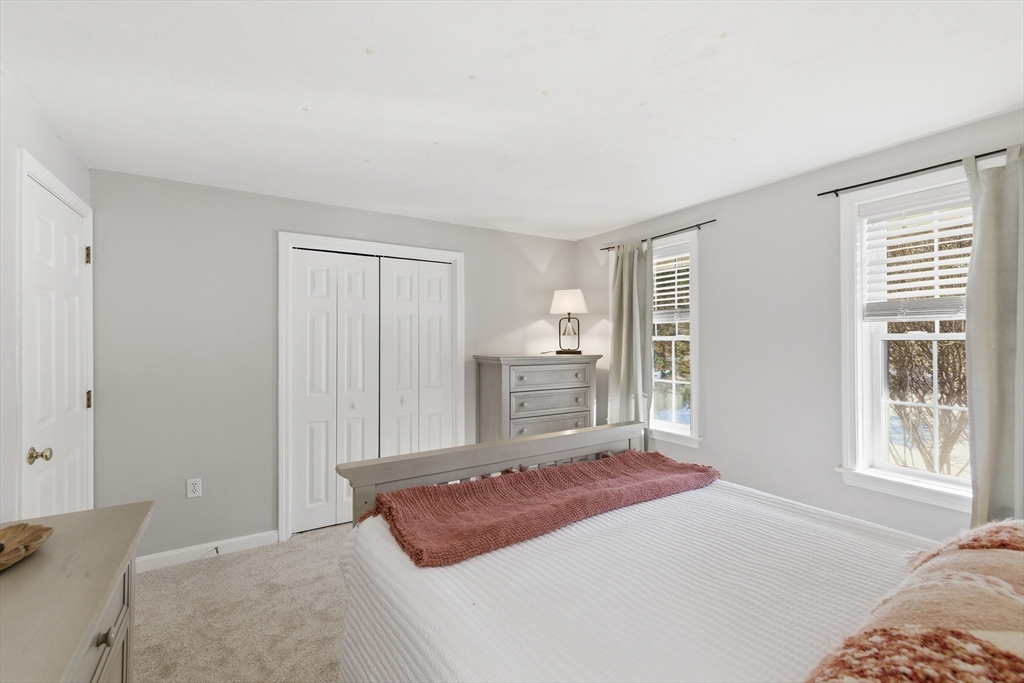 318 Old Mill Road Barnstable, MA 02648 - Photo 27 of 36 a bedroom with a bed and a window