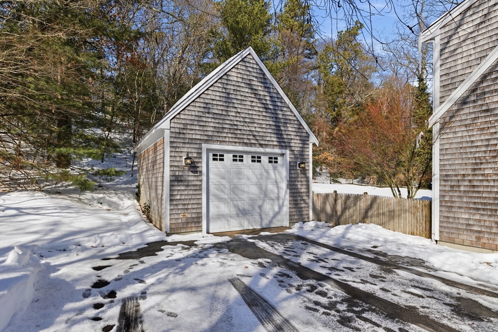 318 Old Mill Road Barnstable, MA 02648 - Photo 31 of 36 a view of a house with a small yard