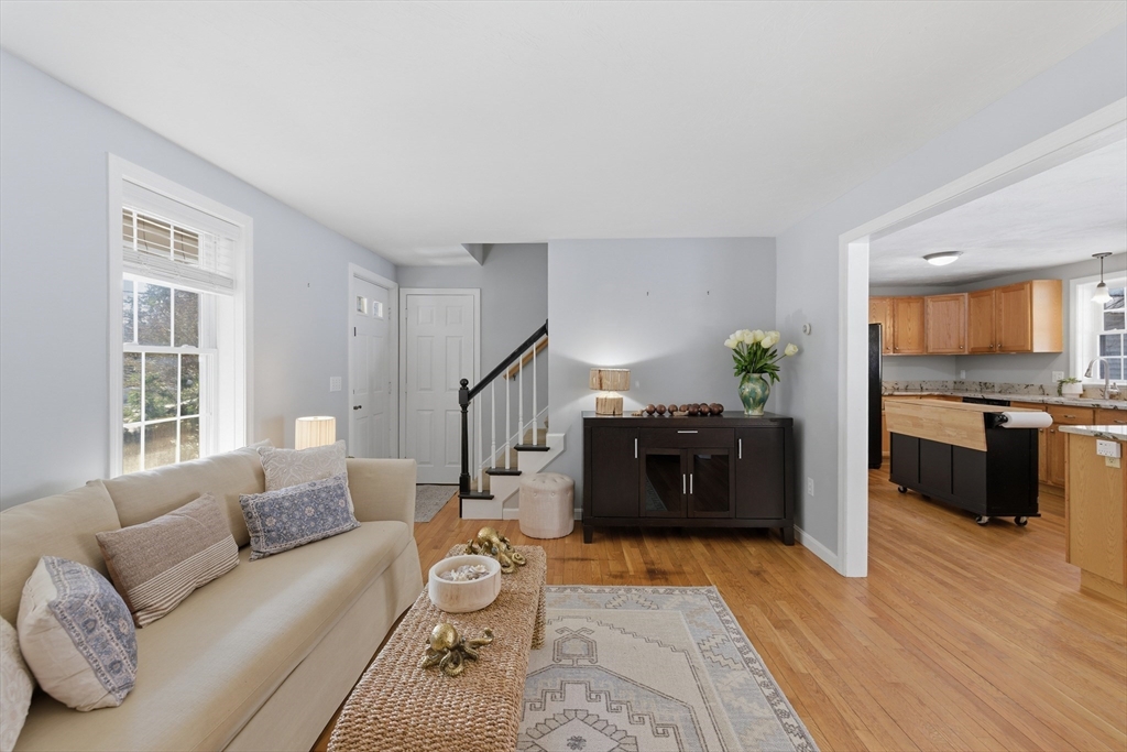 318 Old Mill Road Barnstable, MA 02648 - Photo 7 of 36 a living room with furniture and wooden floor