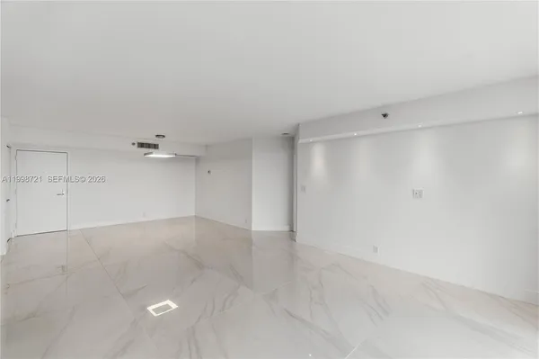 an empty room with window