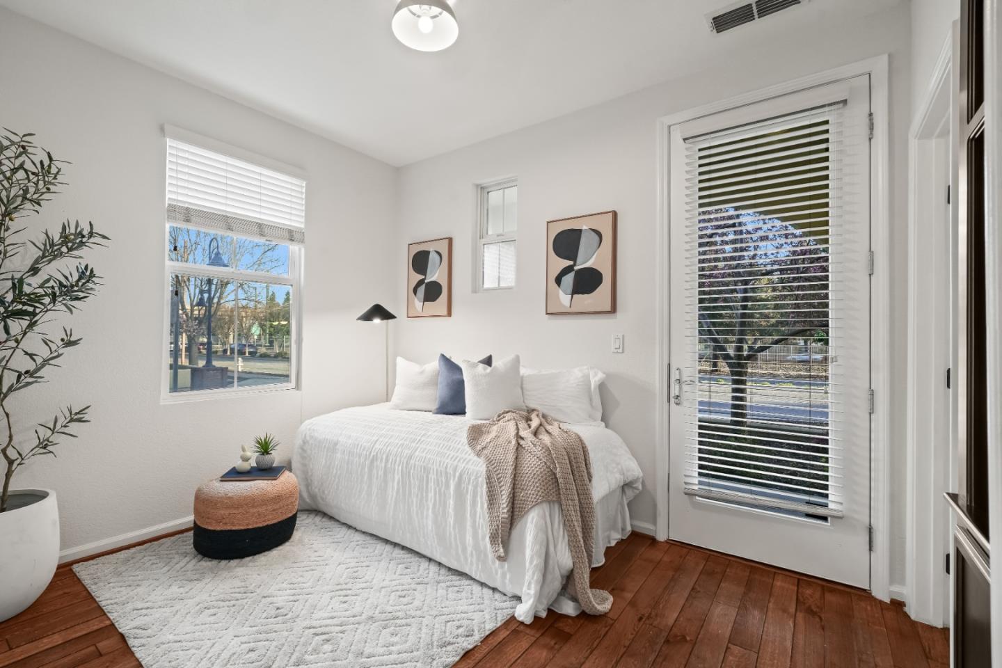 451 Chagall Street Mountain View, CA 94041 - Photo 43 of 58 a bedroom with a bed and wooden floor