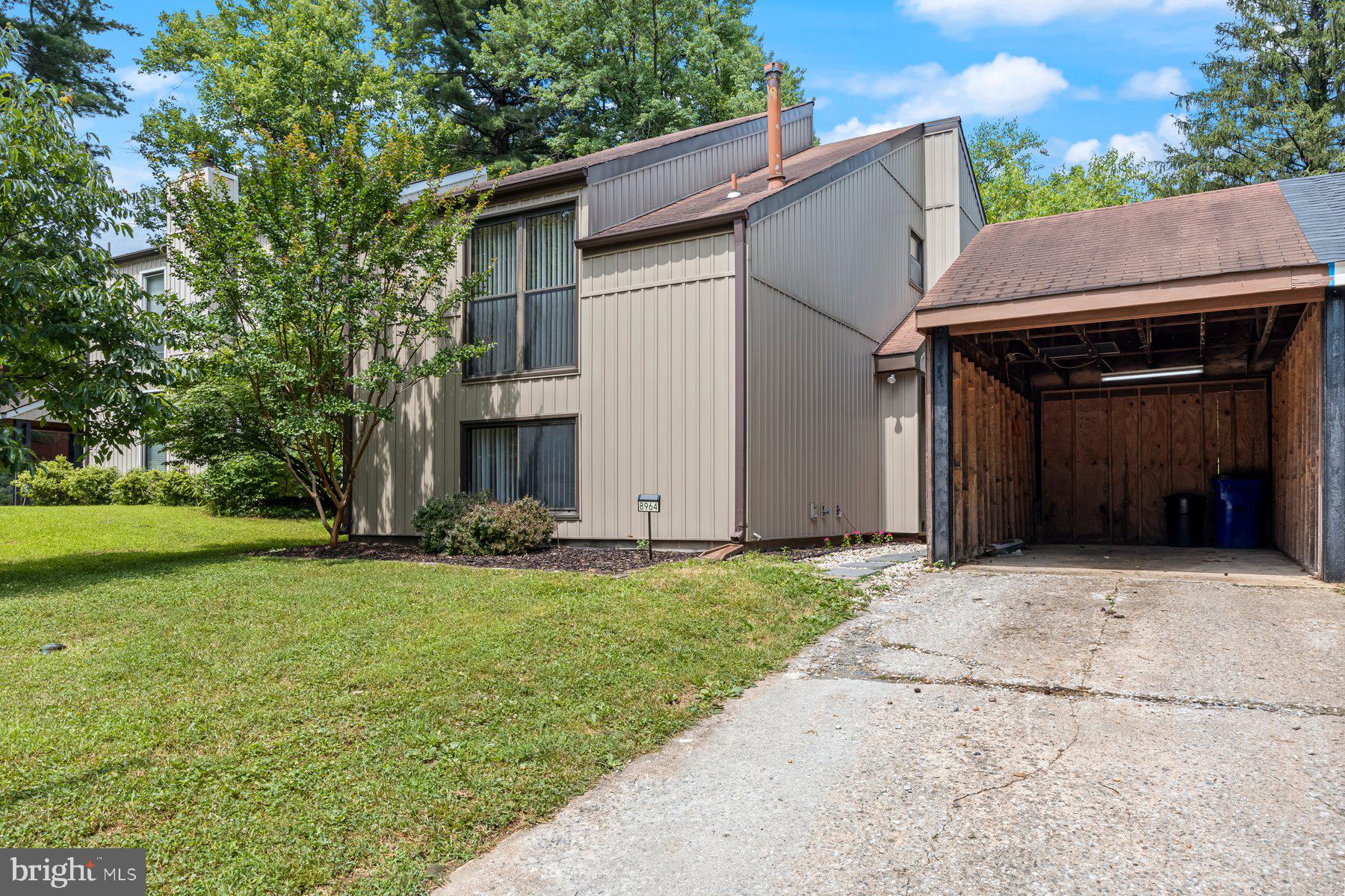 8964 Blue Pool Columbia, MD 21045 - Photo 1 of 36 a view of a house with backyard and garden