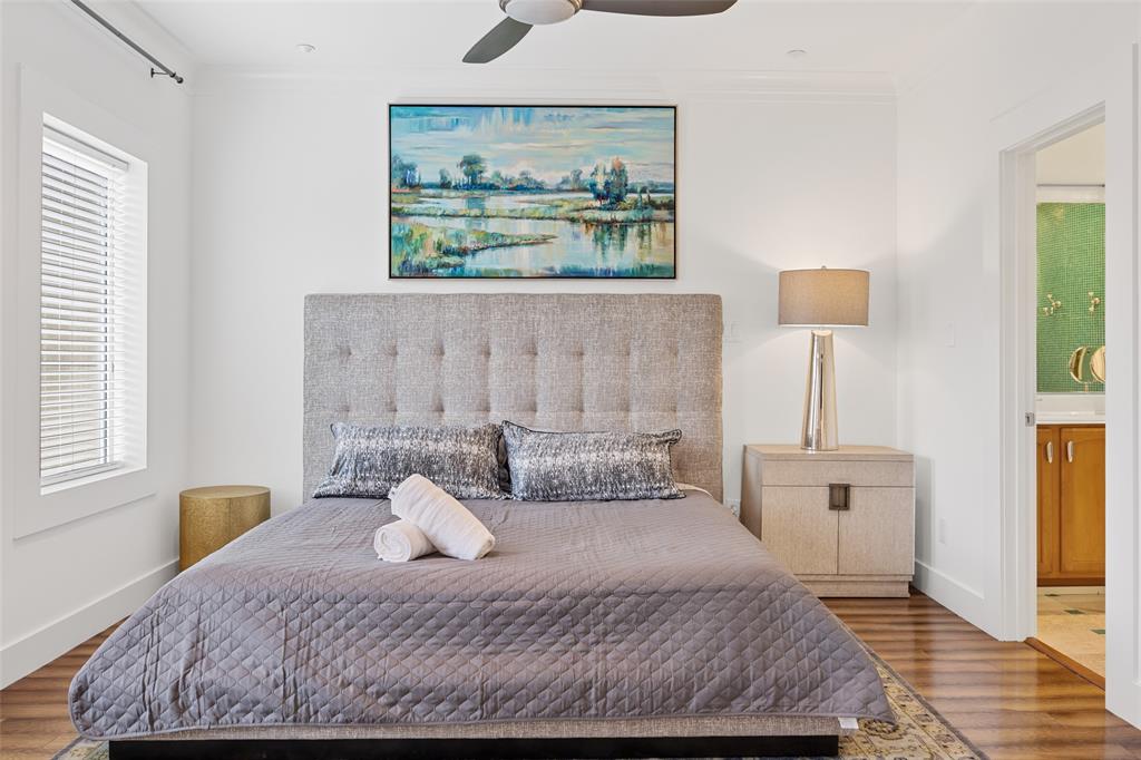 4312 McKinney Avenue, Unit 4 Dallas, TX 75205 - Photo 11 of 34 Bedroom with ornamental molding, wood finished floors, ensuite bathroom, and ceiling fan
