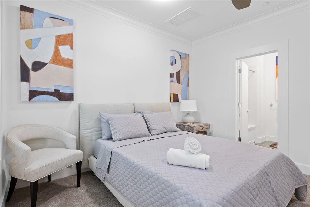 4312 McKinney Avenue, Unit 4 Dallas, TX 75205 - Photo 18 of 34 Bedroom with ornamental molding, carpet, and ensuite bath