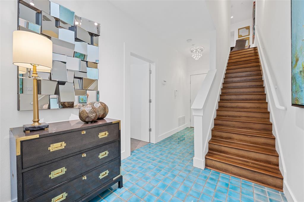 4312 McKinney Avenue, Unit 4 Dallas, TX 75205 - Photo 32 of 34 Staircase featuring baseboards and tile patterned floors