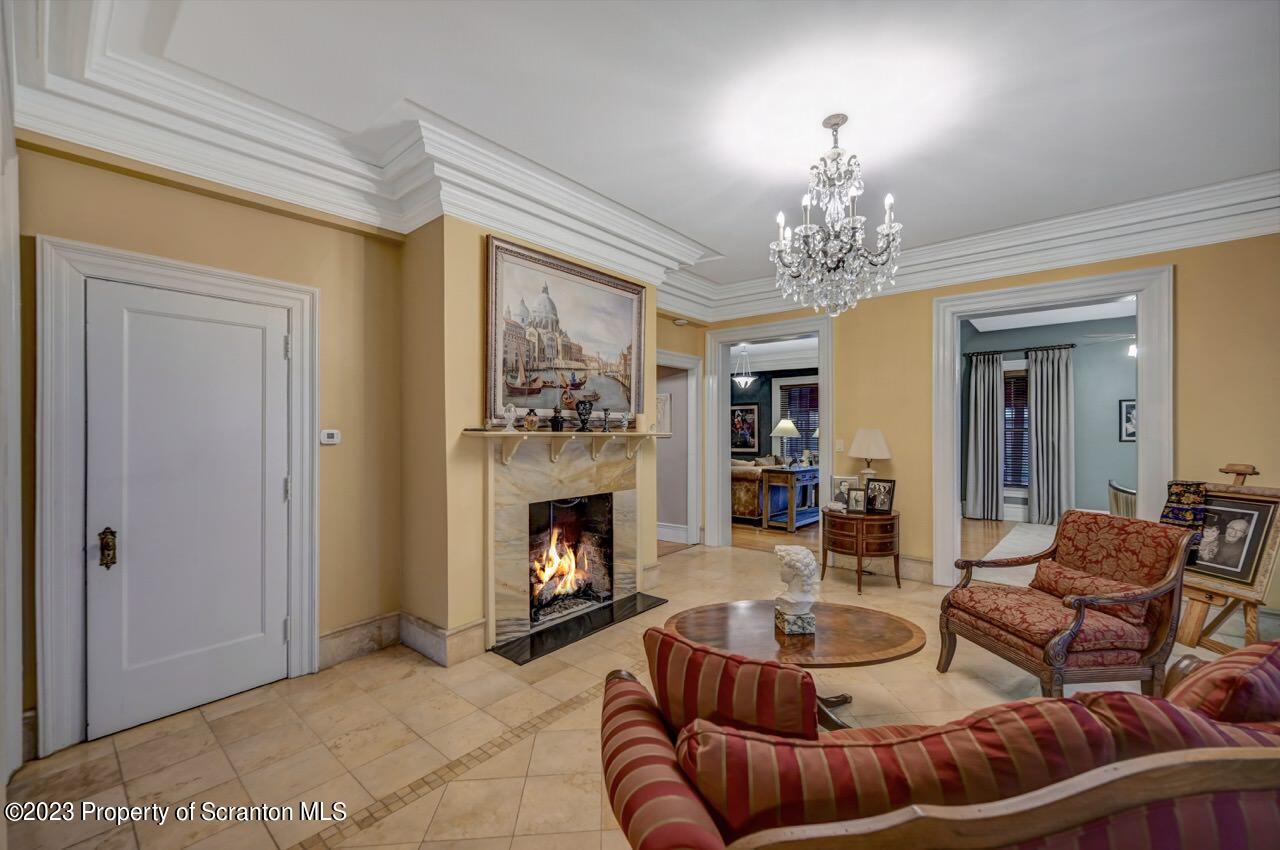 1000 Clay Avenue Scranton, PA 18510 - Photo 12 of 90 a living room with furniture and a fireplace