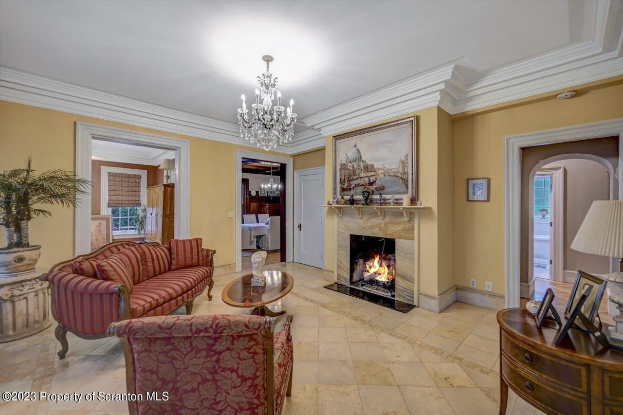 1000 Clay Avenue Scranton, PA 18510 - Photo 14 of 90 a living room with furniture and a fireplace