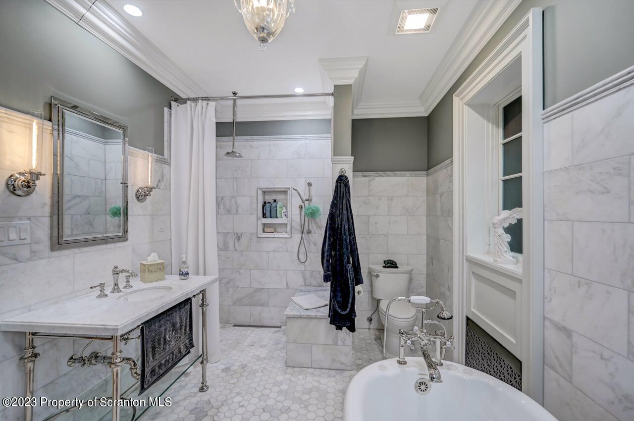 1000 Clay Avenue Scranton, PA 18510 - Photo 31 of 90 a bathroom with a sink double vanity and tub