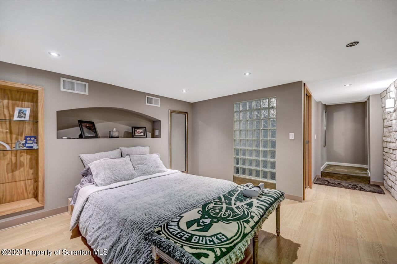 1000 Clay Avenue Scranton, PA 18510 - Photo 49 of 90 a bedroom with a bed and walk in closet with window