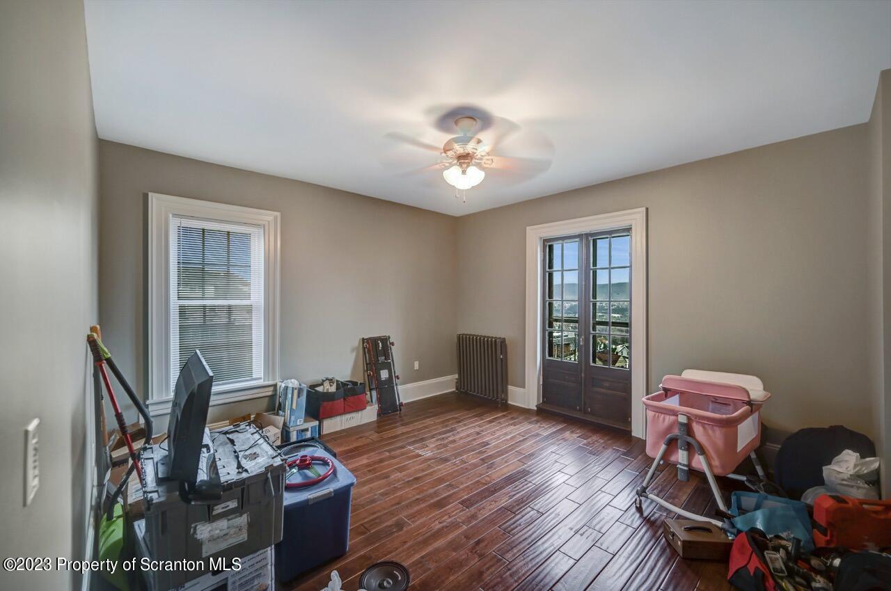 1000 Clay Avenue Scranton, PA 18510 - Photo 64 of 90 a living room with furniture and wooden floor