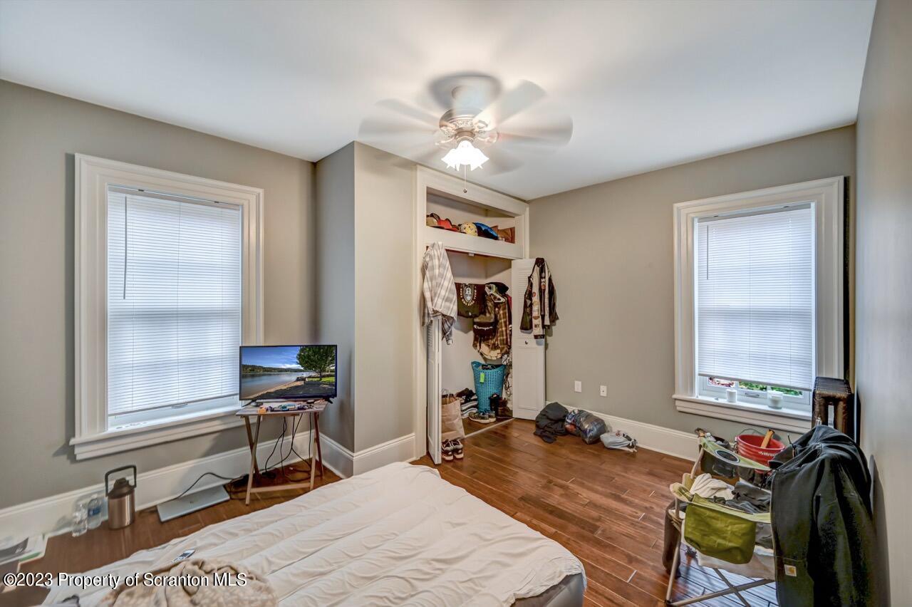 1000 Clay Avenue Scranton, PA 18510 - Photo 68 of 90 a bedroom with a bed desk and a window