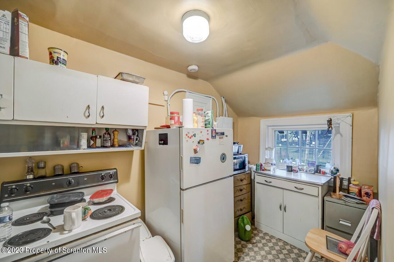 1000 Clay Avenue Scranton, PA 18510 - Photo 78 of 90 a kitchen with a refrigerator and a stove