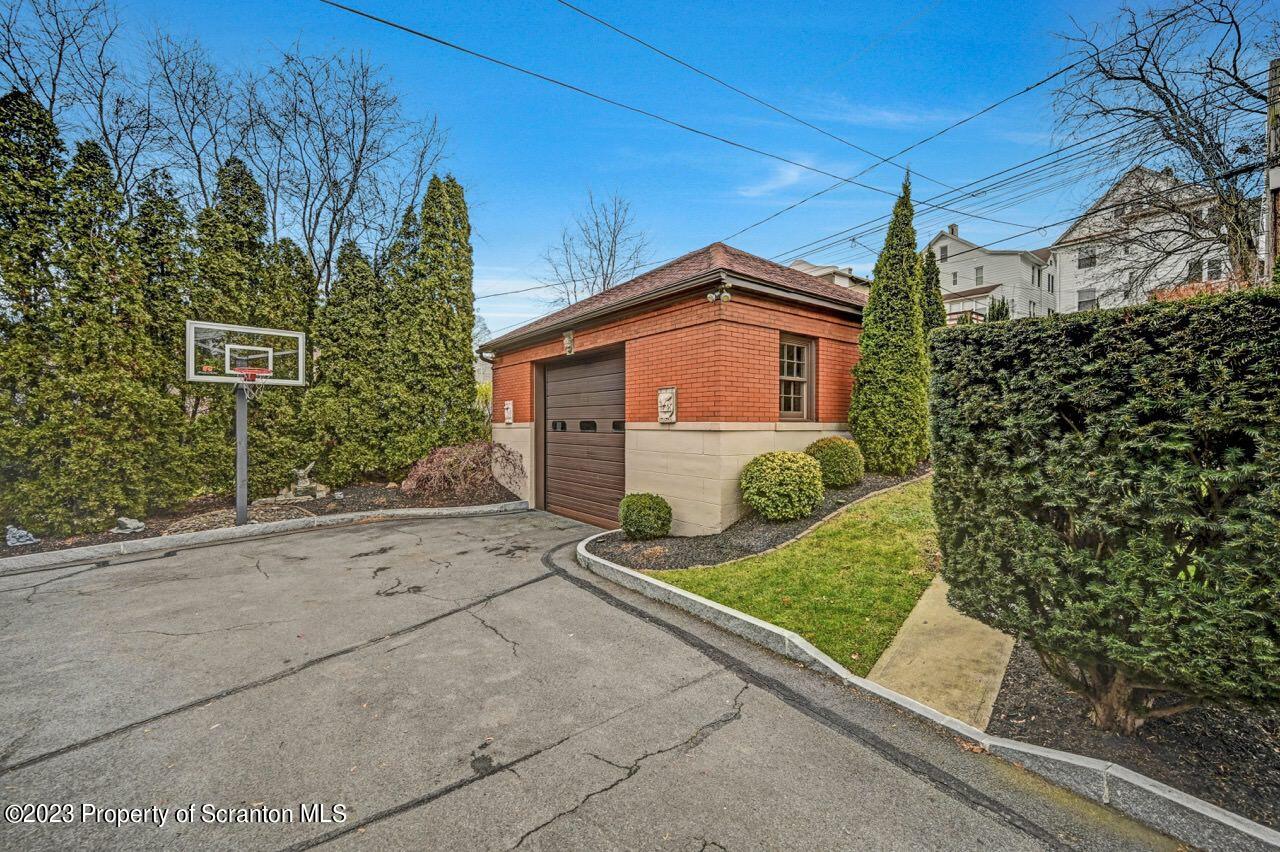 1000 Clay Avenue Scranton, PA 18510 - Photo 81 of 90 a front view of a house with garden