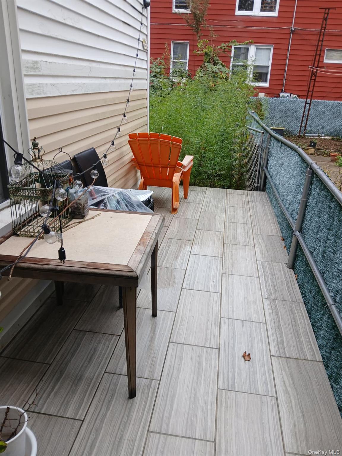 88-10 78th Street Queens, NY 11421 - Photo 11 of 12 View of wooden deck