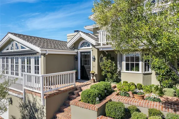 front view of a house with a deck
