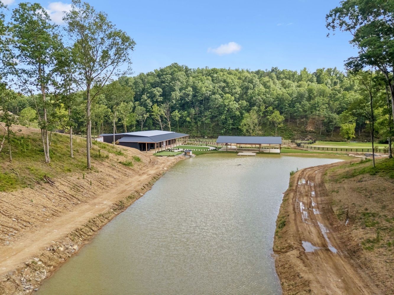 0 Axis Ridge Joelton, TN 37080 - Photo 17 of 19 a view of a swimming pool with a yard and large trees