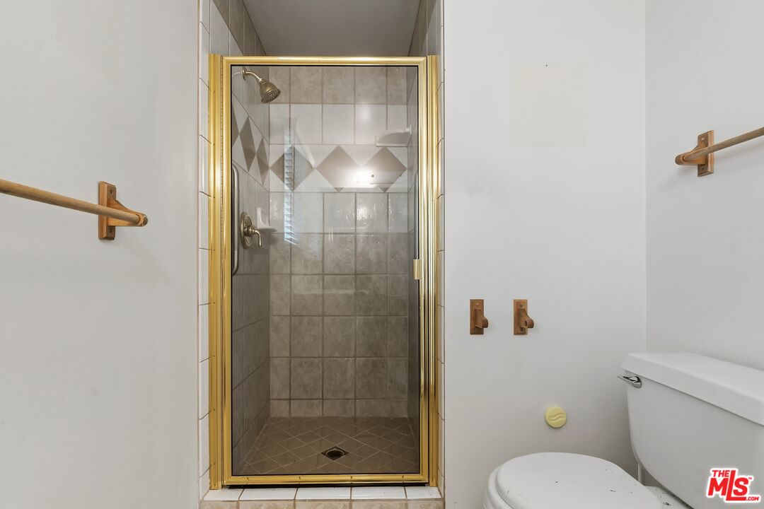 19131 Tulsa Street Porter Ranch, CA 91326 - Photo 27 of 43 a bathroom with a shower