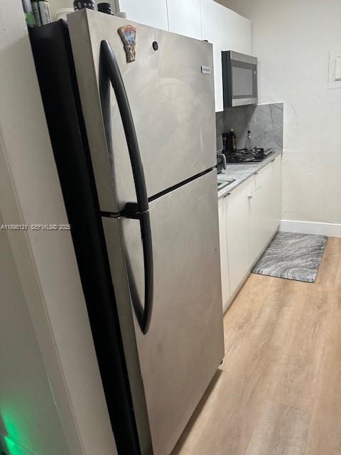 6805 Southwest 88th Street, Unit 12 Pinecrest, FL 33156 - Photo 9 of 18 a view of kitchen with sink and refrigerator