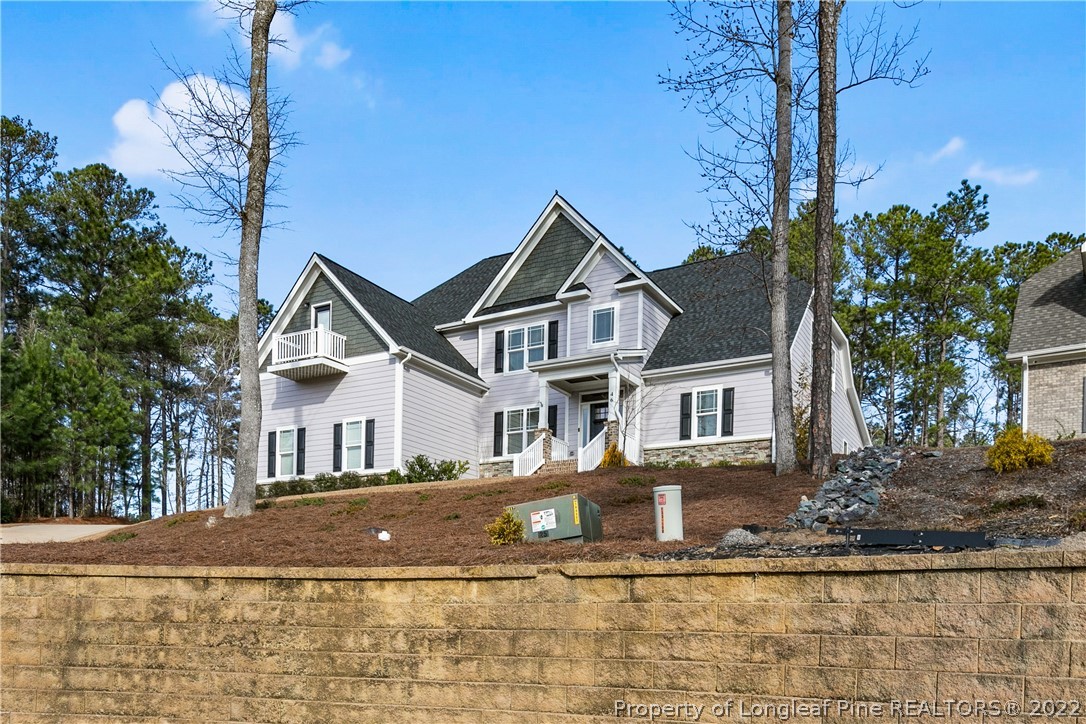 46 Brookhill Court Spring Lake, NC 28390 - Photo 2 of 50 a front view of a house with a yard