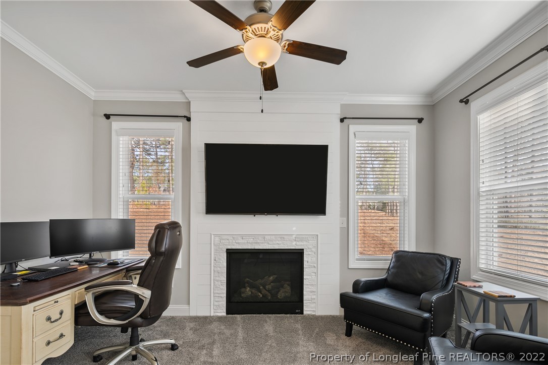 46 Brookhill Court Spring Lake, NC 28390 - Photo 23 of 50 a livingroom with workspace fireplace and a window