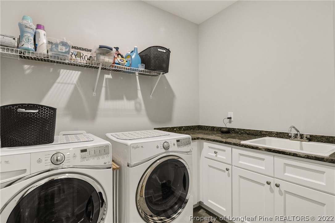 46 Brookhill Court Spring Lake, NC 28390 - Photo 28 of 50 a utility room with dryer and washer
