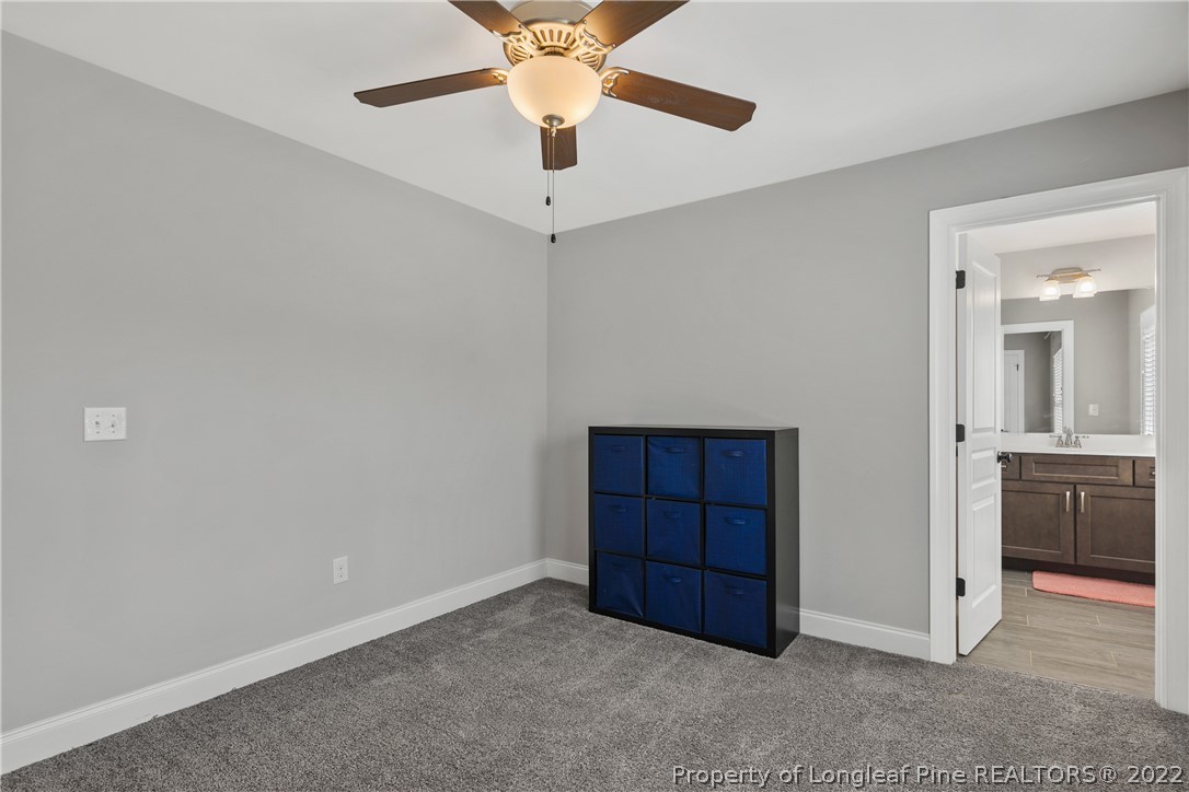 46 Brookhill Court Spring Lake, NC 28390 - Photo 36 of 50 an empty room with closet and fan