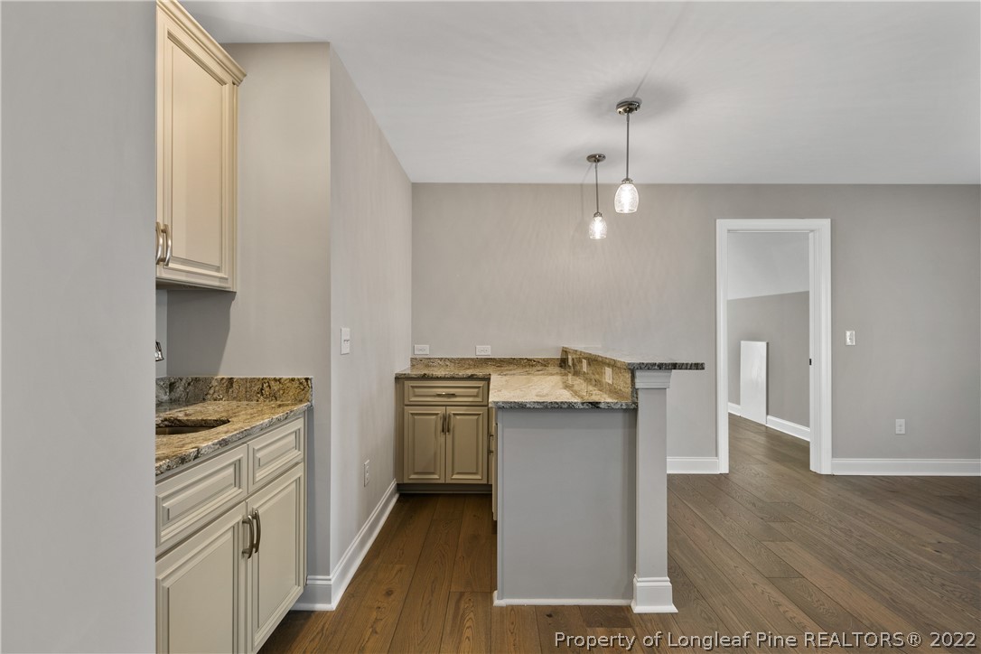46 Brookhill Court Spring Lake, NC 28390 - Photo 43 of 50 a kitchen with stainless steel appliances granite countertop a stove and a refrigerator