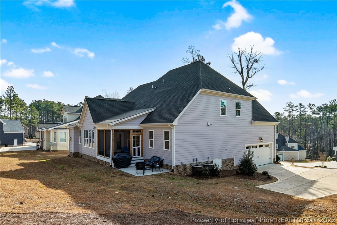 46 Brookhill Court Spring Lake, NC 28390 - Photo 47 of 50 a view of a house with backyard