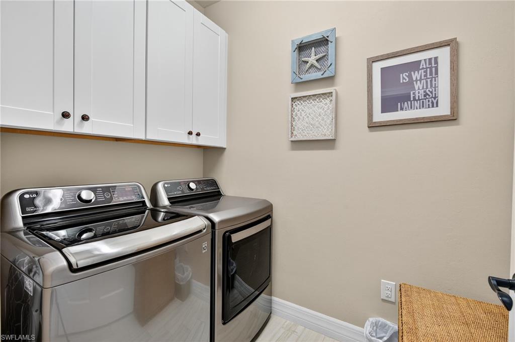 5215 Ciatto Way Ave Maria, FL 34142 - Photo 20 of 46 a utility room with dryer and washer